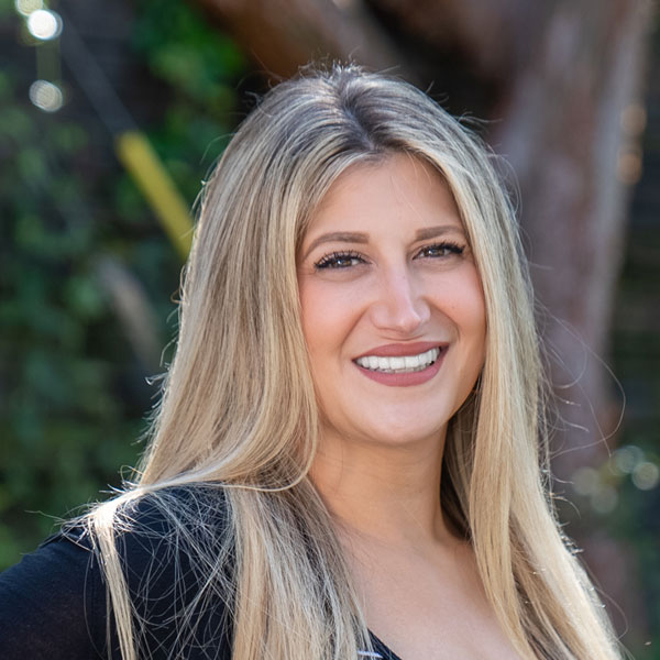 Dental Implants Patient Amanda; smiling. Post Procedure